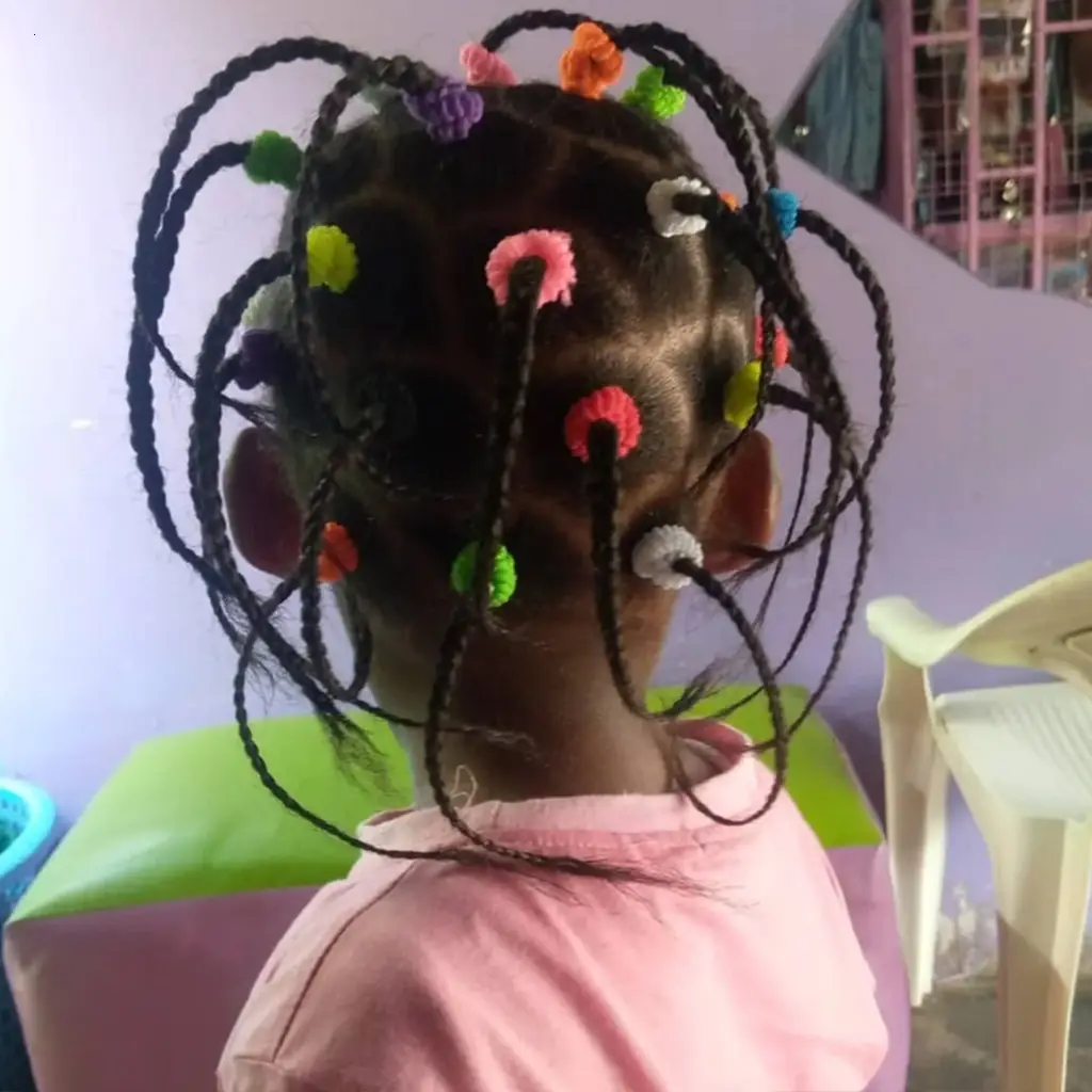 A Mother’s Ingenuity With Her Daughter’s Bouncy Hair Charms Many
