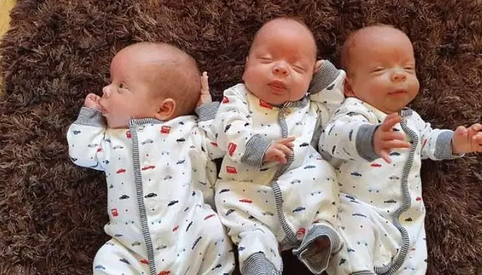 A British mother, 26, outperforms 200 million other women by giving birth to identical naturally developed triplets