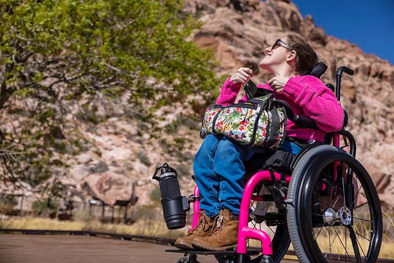 A girl in a wheelchair wanted to go on a mountain trip with her class.